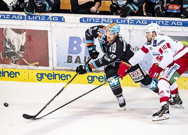 Im Bild: Justin Florek (EHC Liwest Black Wings Linz), Jonas Nordqvist (EC KAC), Eishockey,  EHC Liwest Black Wings Linz vs EC KAC
