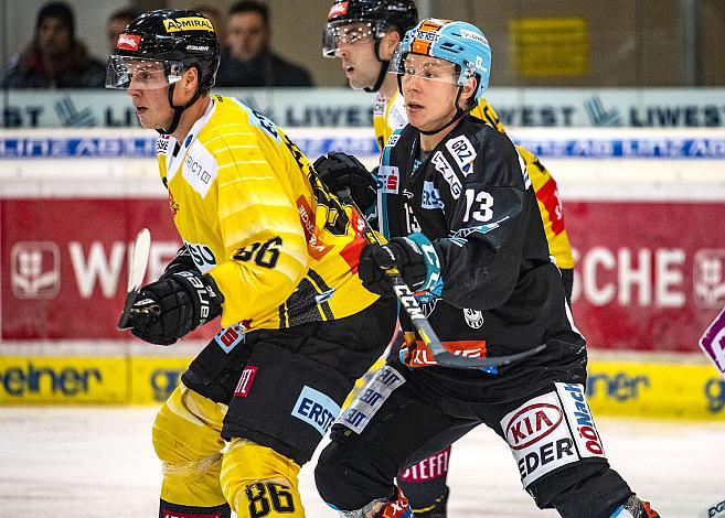 Im Bild: David Aslin (spusu Vienna Capitals), Gerd Kragl (EHC Liwest Black Wings Linz),  Eishockey,  EHC Liwest Black Wings Linz vs Spusu Vienna Capitals
